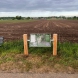 Plaatsing lessenaar informatiebord (houten) staanders (2) - op eigen terrein