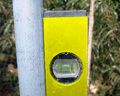Plaatsing paaltje (laag model) in straatwerk - op eigen terrein