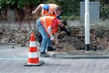 Paal in losse grond + straatwerk + betonmortel - op privé terrein