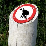 Vlak reflecterend bord Ø100mm hier honden laten poepen verboden