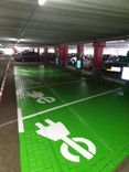 Wegmarkering parkeervak groen + symbool oplaadpunt - wegenverf