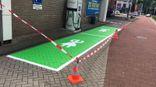 Wegmarkering parkeervak groen + symbool oplaadpunt - wegenverf