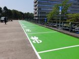 Wegmarkering parkeervak groen + symbool oplaadpunt - wegenverf