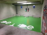 Wegmarkering parkeervak groen + symbool oplaadpunt - wegenverf