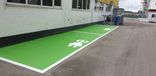 Wegmarkering parkeervak groen + symbool oplaadpunt - wegenverf