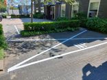 Wegmarkering parkeervak met kruis belijning