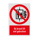 Verbodsbord met pictogram en tekst Bij brand lift niet gebruiken