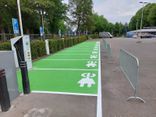 Wegmarkering parkeervak groen + symbool oplaadpunt - wegenverf