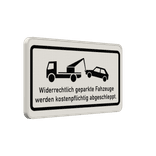 Verkehrsschild mit Symbol und Text - Widerrechtlich geparkte Fahrzeuge werden kostenpflichtig abgeschleppt