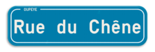 Plaque de rue Belge 7:2 - Ville/Commune - Bleue